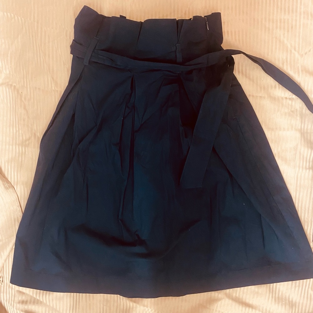 Fashionable Banana Republic Navy Blue knee high skirt size 2P. Fits size 2 .